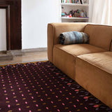 Brown living room with Dark brown and mustard handwoven flatweave rug.