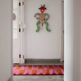 Hallway with Pink and Orange ladder runner rug