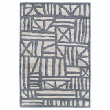 Indigo blue rug handwoven with a design inspired by timber Tudor buildings in natural tones of off-white, ecru and indigo blue.