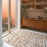 Living space with Mustard Tudor rug handwoven with subtle and organic graphic pattern.