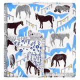 Blue and grey handmade horse print baby quilt made from soft cotton.