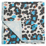 Rockpool Baby Quilt handprinted with illustrations of nostalgic beach scenes.