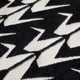 Detail of Black and White Crane flatweave wool rug