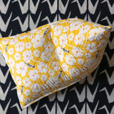 Black and white crane rug with yellow bean bag