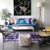 Living Room with Blue and Pink Crane rug