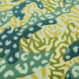 Detail of hand tufted Green Big Cat Camo rug which mixes camouflage and animal print to make a striking statement rug.