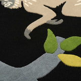Detail of Langur Monkey rug hand tufted in wool with low loop pile and high cut pile motifs.