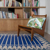 Library and chair with Blue Darjeeling flatweave stripe rug
