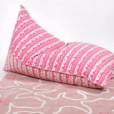 Blush pink hibiscus rug with pink bean bag