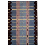 Corbie flatweave rug in Pigeon Blue dusky blue colour shown on a white background.