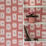 Folk Tales wallpaper in Jaipur Pink with illustrated animal pattern shown in situ.