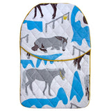 Quilted hot water bottle cover in Horse Ranch fabric, featuring a playful handprinted horse design.